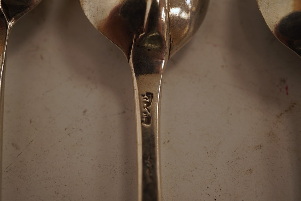 A group of twelve assorted Georgian silver base mark rat tail teaspoons, various dates and makers, indistinct marks, 4.4oz.
